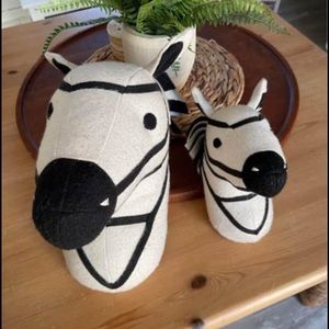 2 wall hanging stuffed zebra heads